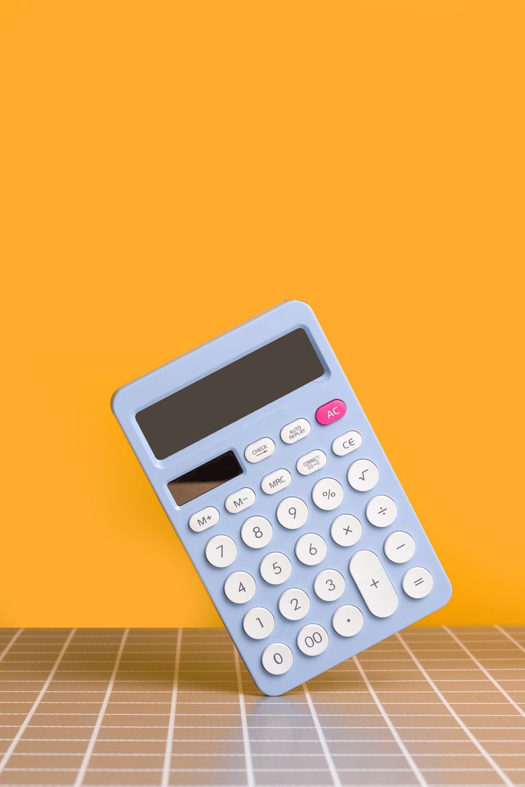 Calculator on Orange Background